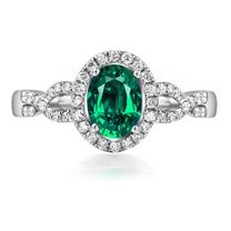 Halo Art Deco 2 Carat Green Emerald 8x6mm Oval Cut And Moissanite Diamond Engagement Ring in 10k White Gold