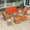 Orange, variant on Kinbor Luxury All Weather Wicker Patio Furniture Set, 7 Pcs Rattan Outdoor Conversation Set, 2 Swivel Chairs, 2 Ottomans, 3-Seater Sofa, Outdoor Coffee Table and Side Table, Beige