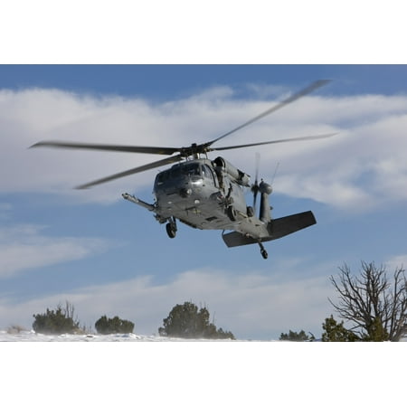 An HH-60G Pave Hawk flys low over a landing zone in New Mexico Canvas Art - HIGH-G ProductionsStocktrek Images (35 x