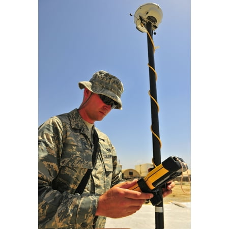 US Air Force engineer using global positioning system-based survey equipment Canvas Art - Stocktrek Images (23 x 35)