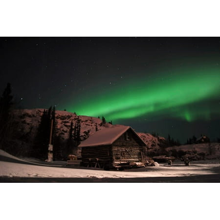 Aurora borealis over a cabin Northwest Territories Canada Poster Print by Jiri HermannStocktrek