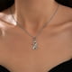 thumbnail image 1 of Collar elegante con colgante de cinta de mariposas para el Día del Cuidado de la Mujer, 1 of 6