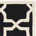 thumbnail image 3 of Safavieh Cambridge 5' X 8' Hand Tufted Wool Rug in Black and Ivory, 3 of 3