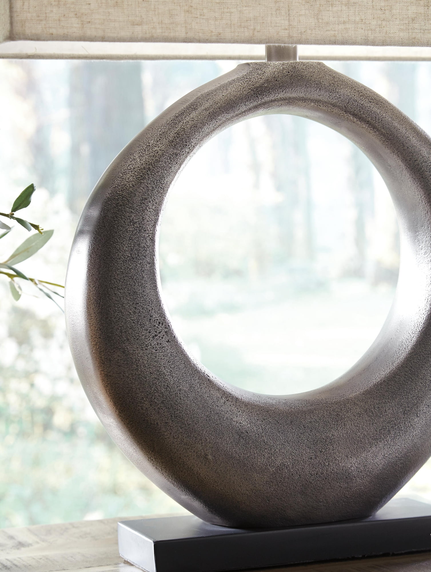 Signature Design by Ashley Saria Metal Table Lamp, Antique Silver Finish, Modern Sculptural Lamp with Open Ring Base and Rectangular Shade