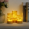 thumbnail image 3 of Merrynights Flickering Flameless Candles with Remote Battery Operated Timer Acylinder LED Embedded String Lights Gold Set of 3, 3 of 8