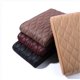 thumbnail image 1 of Alfombrilla para reposabrazos de coche Yashi de piel sintética con bordado de ondas color negro, 1 of 4