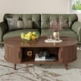 thumbnail image 4 of Oval Coffee Table, 42.5" Drum Coffee Table with Sliding Tambour Door, Fluted Accent Center Table with Storage, Mid Century Modern Coffee Table for Living Room, Center Table Walnut, 4 of 7