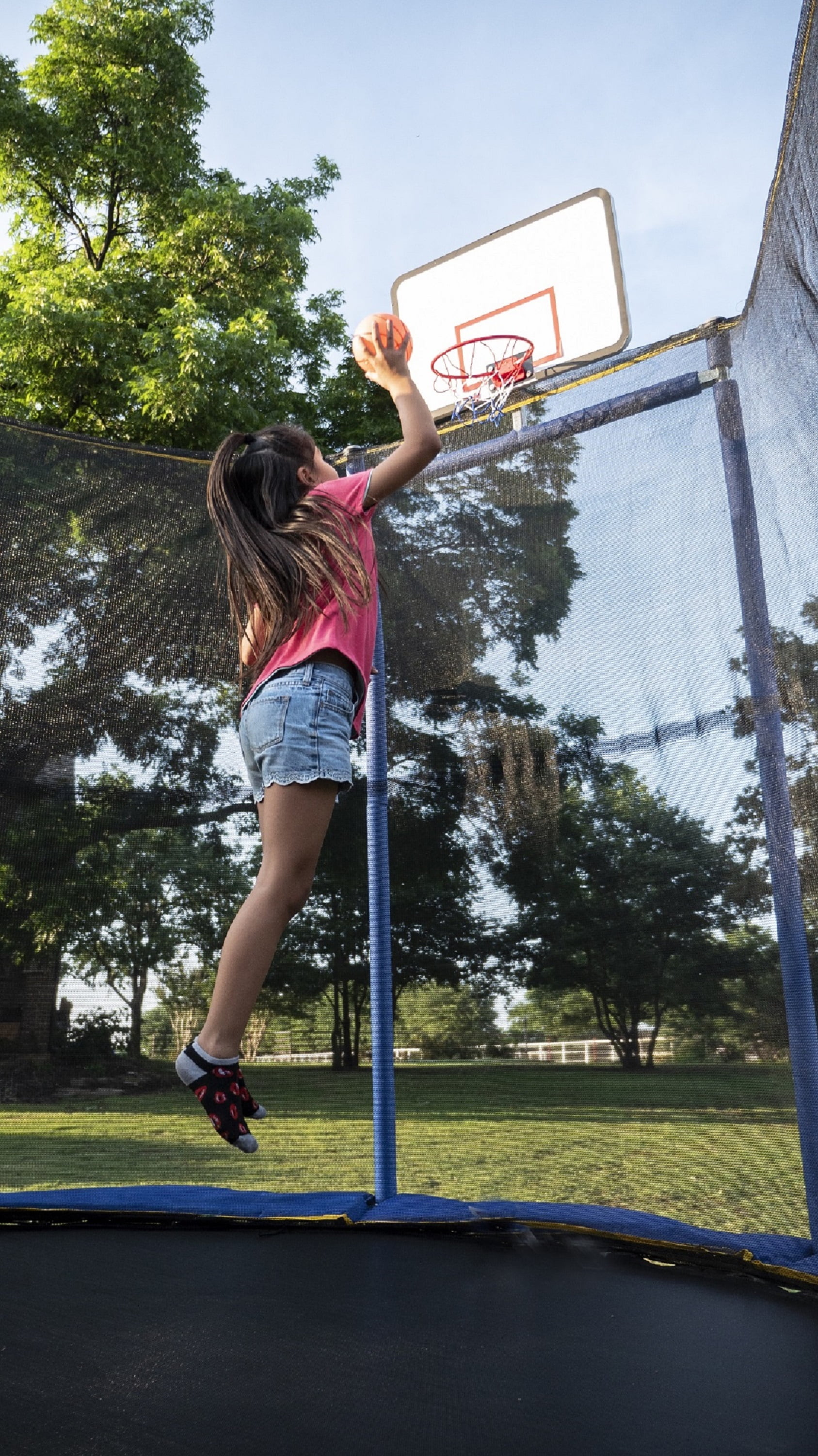 JumpKing Oval 10' x 15' Trampoline, with Basketball Hoop, Blue/Yellow