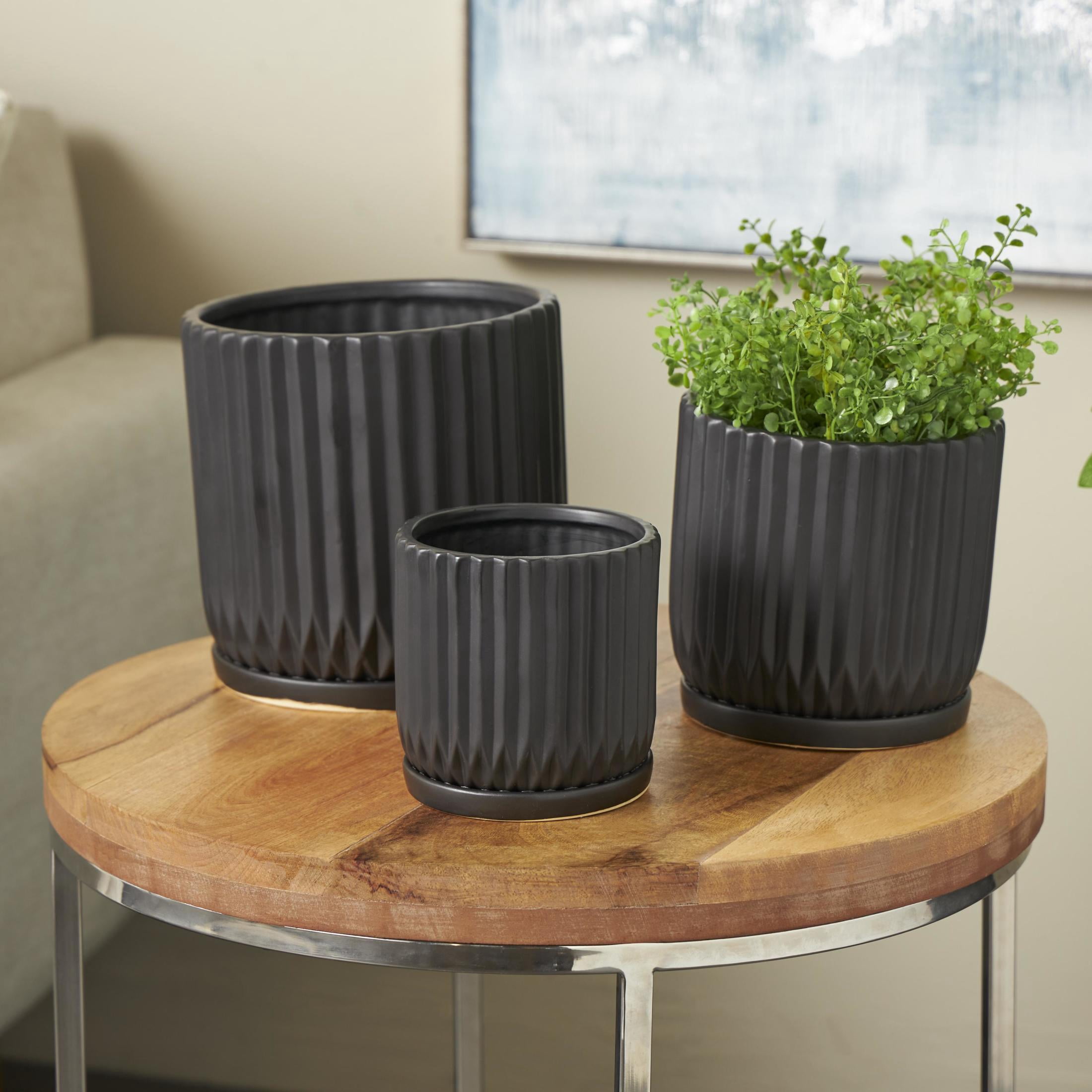 DecMode 8",7",5"H Ribbed Black Ceramic Planter with Attached Saucer (3 Count)