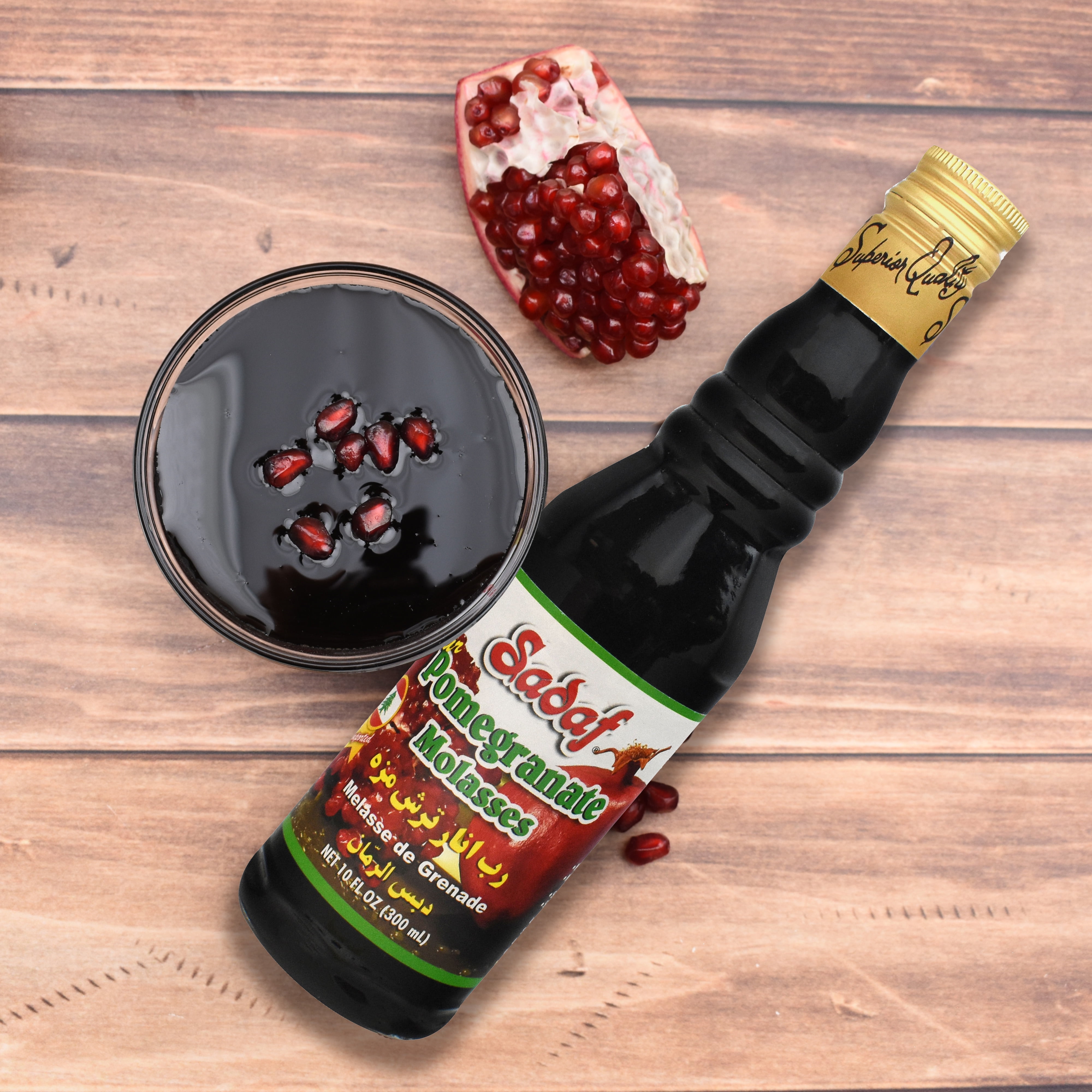 Sadaf brand Pomegranate Molasses, 10 Fl oz. in a bottle