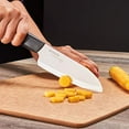 thumbnail image 2 of Kyocera Advanced Ceramic Revolution Series 5-1/2-inch Santoku Knife, Black Handle, White Blade, 2 of 3