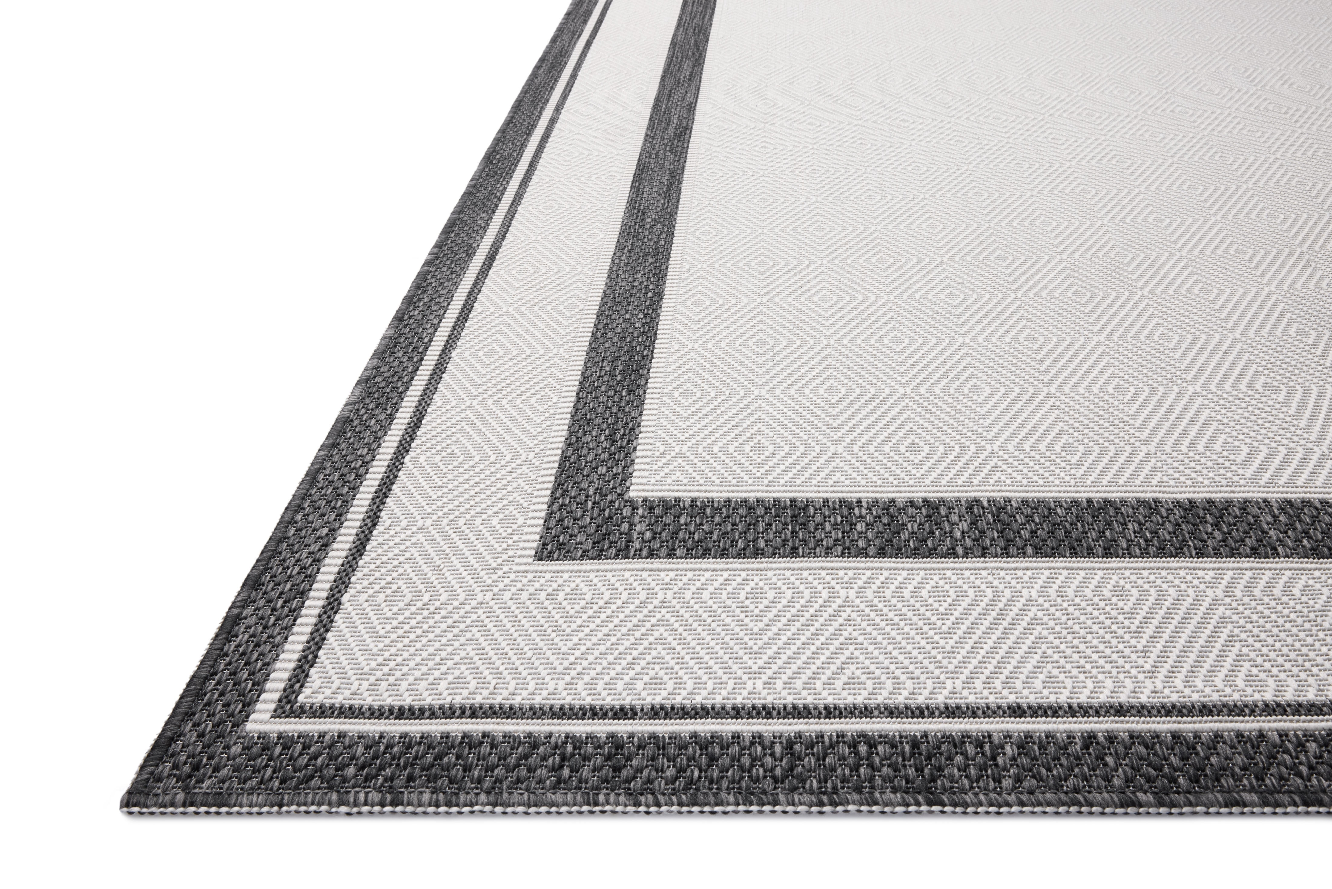 Indoor Outdoor Rug 7x9, Reversible, Loloi Easton Onyx / Ivory (6'7" x 9'4")