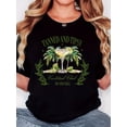 thumbnail image 1 of Camiseta De Mujer Ligera Y Suave VeranoWomen's Retro Minimalist "Tanned and Tipsy Sip Chill" Coconut Drink Graphic Tee - Soft, Casual Round Neck Short Sleeve Shirt, Palm Tree & Lemon Design, Black,, 1 of 6