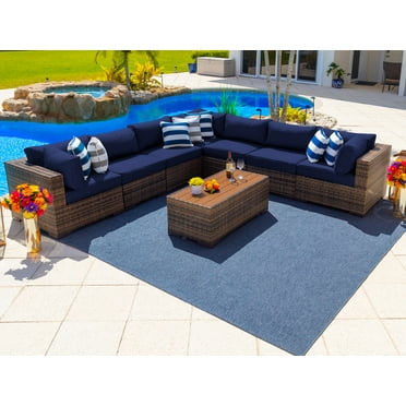 Sorrento 8-Piece Resin Wicker Outdoor Patio Furniture Sectional Sofa Set in Brown w/ Seven Sectional Seats and Coffee Table (Flat-Weave Brown Wicker, Sunbrella Canvas Navy)