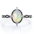 thumbnail image 1 of JeenMata Anillo de Compromiso Art Déco de Cinco Piedras con Diseño Antiguo de Ópalo Etíope de Corte Ovalado de 1,5 Quilates y Moissanita en Baño de Oro Negro de 18 K sobre Plata, 1 of 6