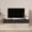 Black, variant on Resenkose Hanging Floating Media Stand with RGB LED Lighting and Power Outlet, Sleek Wood Finish TV Shelf with Ample Storage Space for Home, Wood