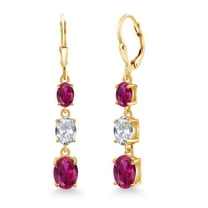 Gem Stone King 18K Yellow Gold Plated Silver Red Created Ruby 3 Stone Dangle Earrings for Women (5.70 Cttw, Gemstone July Birthstone, Oval 8X6MM, 7X5MM and 6X4MM)