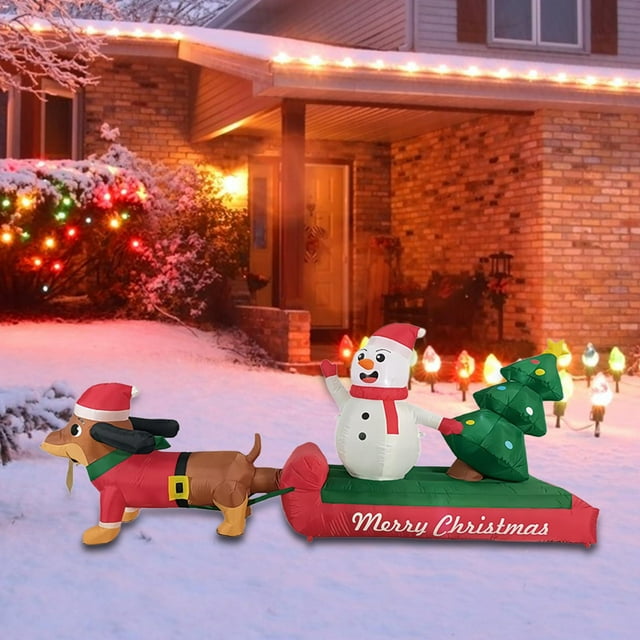 Decoración navideña inflable para exteriores: salchicha luminoso tirando de un trineo. Divertida decoración para jardín.