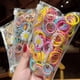 thumbnail image 3 of 100 unids/bolsa encanto niños lindos dulces dibujos animados bandas de goma sólidas niñas encantadoras bandas elásticas para el cabello niños dulces accesorios para el cabello, 3 of 4