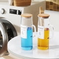 thumbnail image 2 of KitHero Laundry Detergent Dispenser Set with Bamboo Lids and Handles - Easy Pour 3 Pack 50 oz Liquid Laundry Containers for Laundry Room Organization and Storage, 2 of 8
