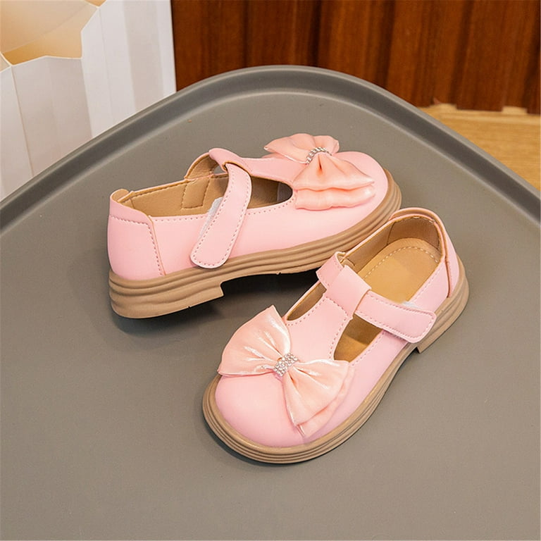 light pink dress with red shoes Pamela Anderson Made This Formerly "Cheap" Shoe Look Chic