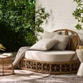 thumbnail image 3 of Light brown fabric daybed with woven wicker and 3 pillows for outdoor boho - style lounging, 3 of 5