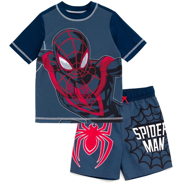 set de baño marvel spider-man miles morales rash guard black 7-8 Conjunto de rash guard de manga corta y shorts en negro y azul marino; camiseta con gran ilustración sublimada de Miles Morales en postura dinámica, mangas raglán en contraste y costuras visibles; shorts con estampado de telaraña y texto "SPIDEY MAN" en el lateral, cintura elástica con cordón ajustable y forro de malla; material de secado rápido y protección solar UPF 50+. Adecuado para playa o piscina.