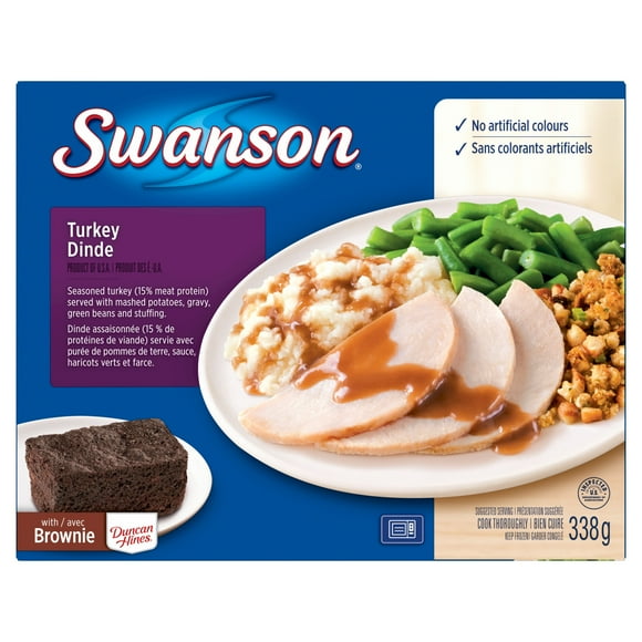 Repas de dinde Swanson : de la dinde assaisonnée, servie avec de la purée de pommes de terre, de la sauce, des haricots verts et de la farce 338g