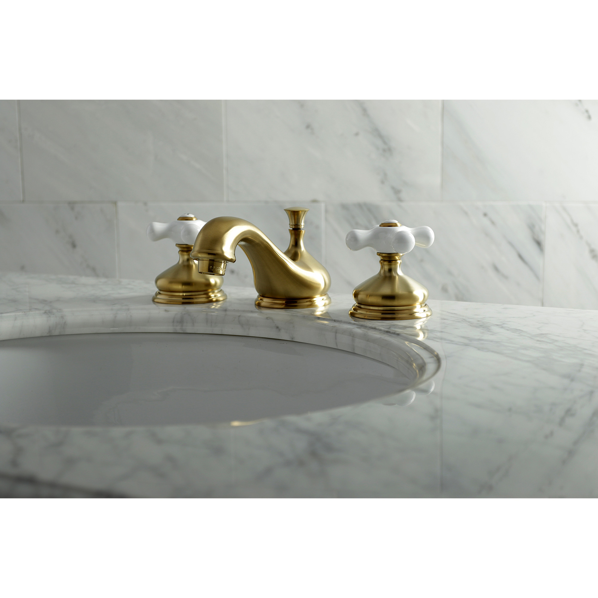 Kingston Brass KS1167PX Heritage Two-Handle 3-Hole Deck Mount Widespread Bathroom Faucet with Brass Pop-Up in Brushed Brass