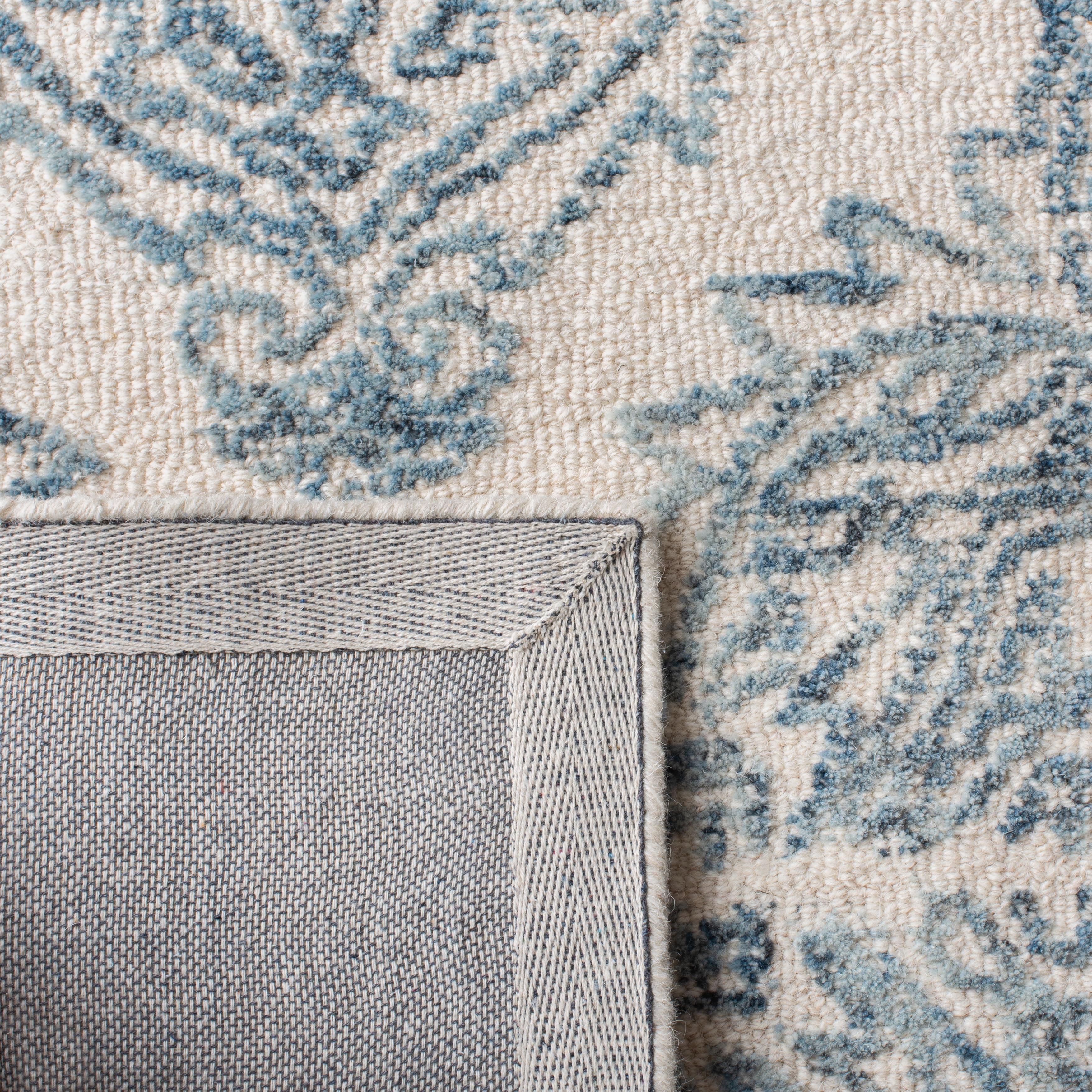 SAFAVIEH Abstract Rachelle Floral Wool Area Rug, Ivory/Blue, 10' x 14'