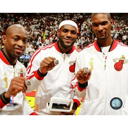 Dwyane Wade LeBron James & Chris Bosh with their 2013 NBA Championship Rings Photo
