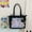 Black, variant on Japanese Ita Crossbody Bag - Large Capacity Kpop Tote with Clear Display Panel, PU Leather & Adjustable Strap (14.96x8.27x7.09in)
