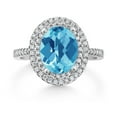 thumbnail image 2 of Gem Stone King 925 Sterling Silver Halo Engagement Ring Oval Checkerboard Swiss Blue Topaz and Moissanite (2.68 Cttw) | Size 6, 2 of 3