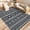 Black and White, variant on Garvee Outdoor Area Rug 9'x12' Waterproof Outdoor Carpet, Boho Plastic Straw Rug RV Mat for Picnic, Deck, Balcony, Beach, Patio, Dark Blue and White