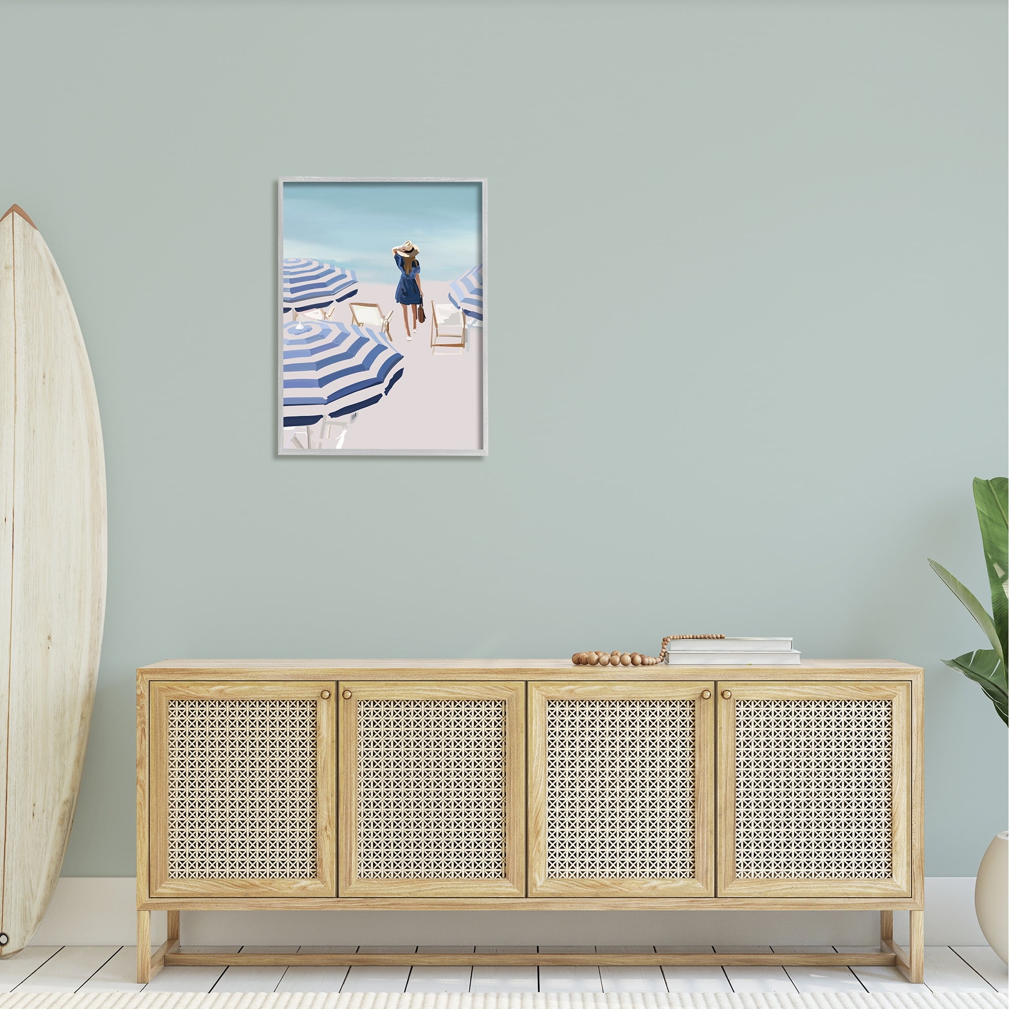 Stupell Industries Woman Enjoying Beach Shore Umbrellas Coastal Scene Graphic Art Gray Framed Art Print Wall Art, Design by Amelia Noyes