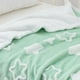 thumbnail image 3 of Manta de bebé TCOYIWL reversible con forma de estrella Jacquard 84 x 109 cm, color verde, 3 of 8