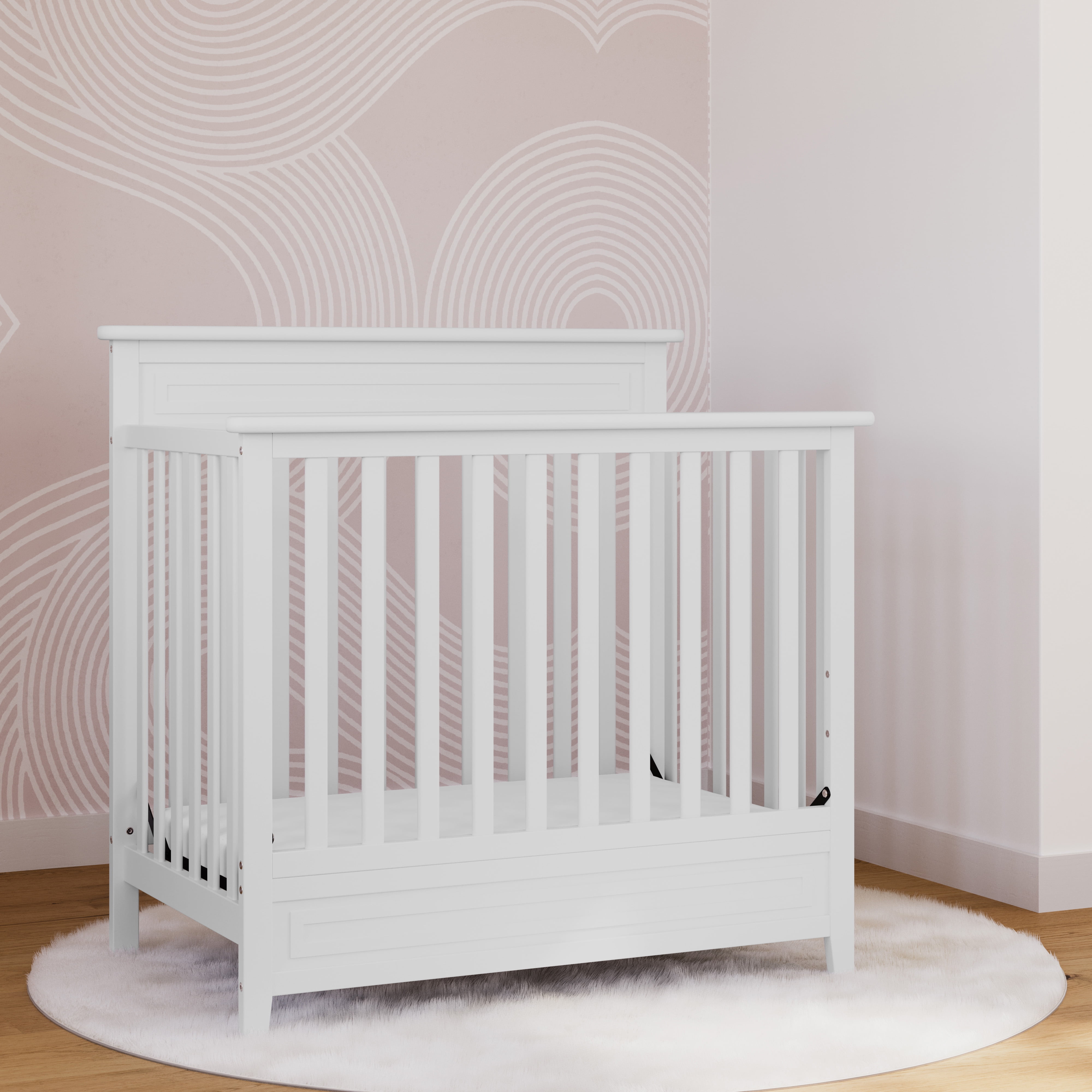 Storkcraft Petal Mini 4-in-1 Convertible Baby Crib with Mattress, White