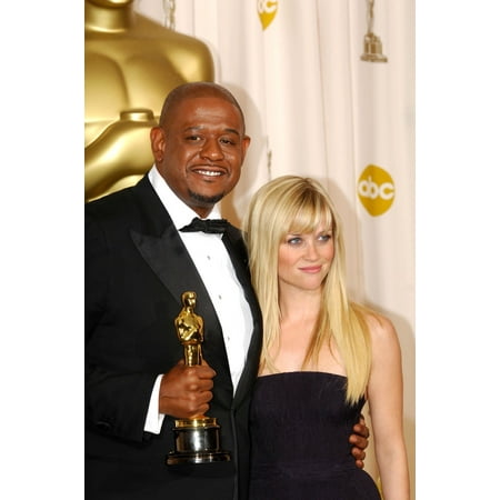 Forest Whitaker Winner Of Best Actor For The Last King Of Scotland Reese Witherspoon In The Press Room For Oscars 79Th Annual Academy Awards - Press Room The Kodak Theatre Los Angeles Ca February 25