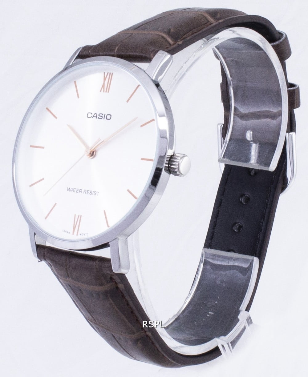 Casio Men’s Silver Analog Watch with Orange Accents and Brown Leather Strap -