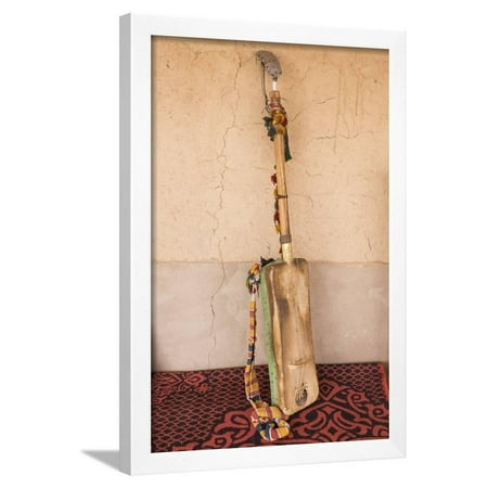 Moroccan Musical Instruments Morocco, Sahara region. Hajhouj or guembri musical instrument used in Gnawa music. Framed Print Wall Art By Brenda Tharp ()