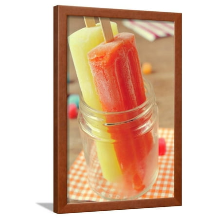 Closeup of Two Appetizing Ice Pops of Different Flavors in a Glass Jar Framed Print Wall Art By nito
