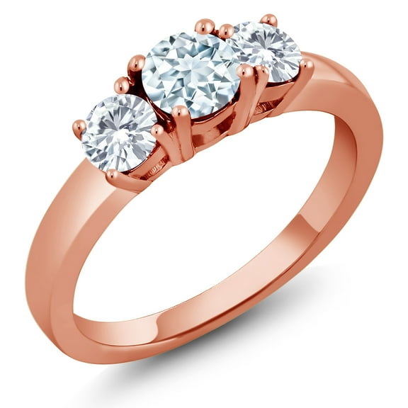 Gem Stone King 18K Rose Gold Plated Silver 3-Stone Ring Round Sky Blue Aquamarine and Moissanite (0.96 Cttw, Size 7)