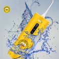 thumbnail image 2 of Irrigador bucal portátil con chorro de agua - Yellow Duck Irrigator, resistente al agua IPX7, 1 boquilla de chorro, 3 diferentes, 2 of 4