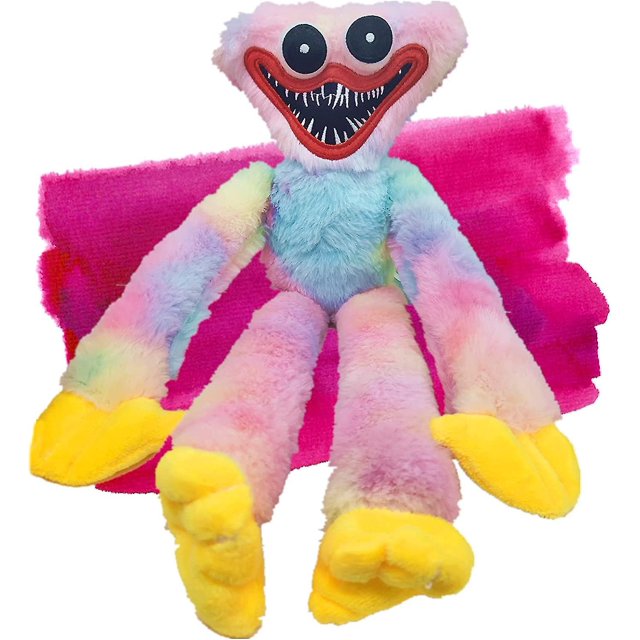peluche huggy wuggy figura de peluche poppy playtime de 40 cm peluche Foohvr de 40 cm, vista frontal centrada; cabeza triangular con boca roja y colmillos impresos, ojos negros redondos, pelaje multicolor pastel, brazos y piernas largos con velcro en palmas, manos y pies amarillos de felpa, textura suave, fondo rosa. Suele usarse como juguete, adorno de Halloween o regalo de Navidad.