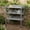 Gray, variant on Resenkos Storage Hook Equipped Garden Workstation, 3-Tier Solid Wood Outdoor Planting Bench with Metal Top for Garage and Yard, Gray