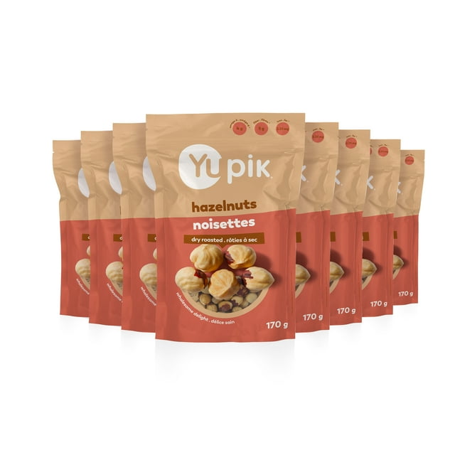 Yupik Dry Roasted Hazelnuts, Gluten-Free, Kosher, and Unsalted, packaged in an 8-count set of 170 g bags. The image shows multiple resealable pouches with a beige and red design, featuring the Yupik logo and a clear window displaying crunchy hazelnuts. Ideal as a healthy snack or topping for ice cream, these oil-free filberts are a source of fiber and iron.