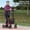 red, variant on Stylish Blue Adjustable Rollator Walker with Seat and Backrest, Lightweight Foldable Mobility Aid with 10" All-Terrain Wheels, Height Adjustable Handles,Stable Metal Frame and Storage Bag