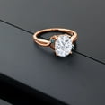 thumbnail image 4 of Gem Stone King 18K Rose Gold Plated Silver White Moissanite and Blue Diamond 3 Stone Ring for Women (3.03 Cttw, Oval 10X8MM, Gemstone Birthstone, Size 8), 4 of 4