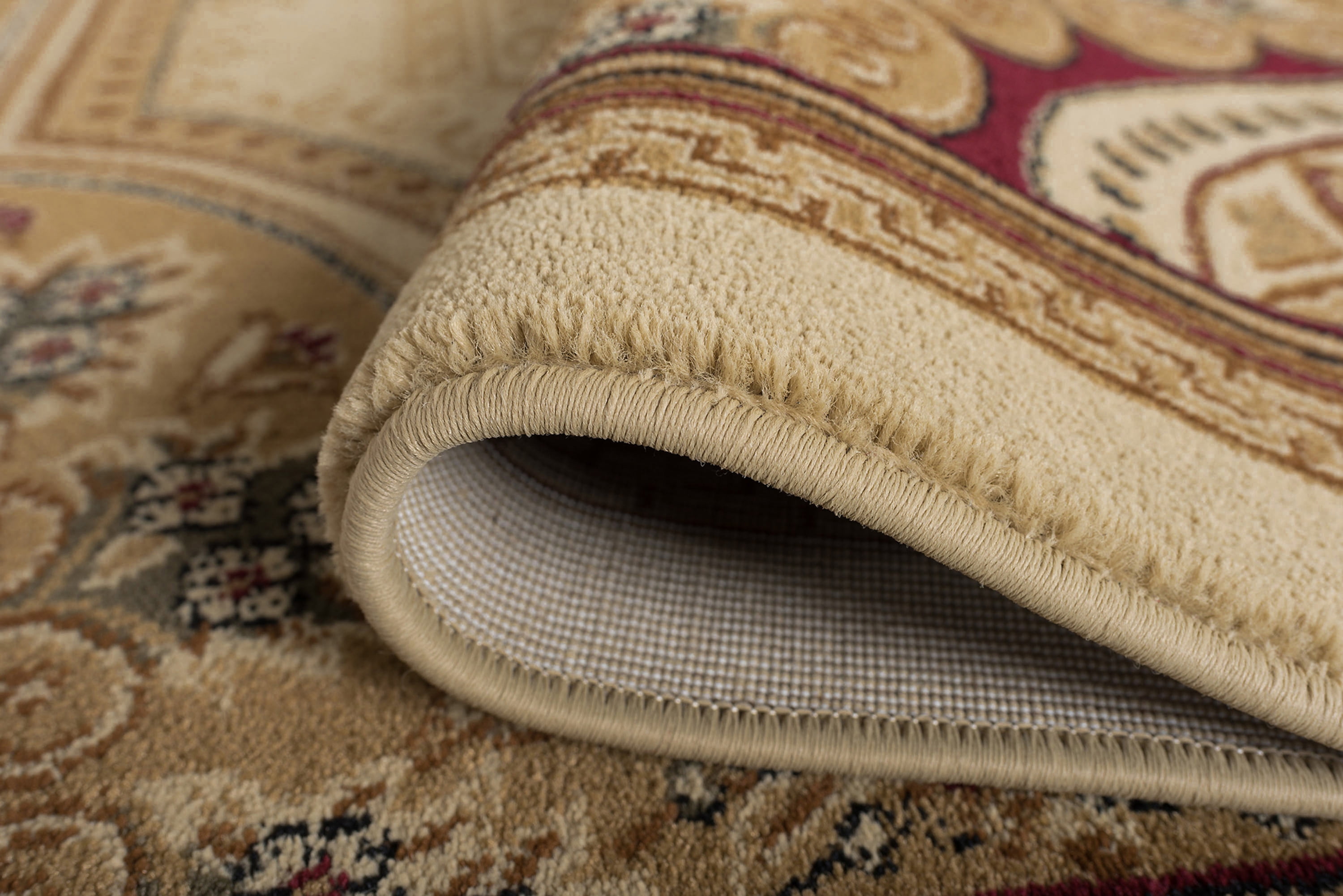 Sensation Traditional 2' x 10' Ivory and Scarlet Polypropylene Indoor Area Rug
