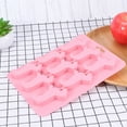 thumbnail image 2 of Molde de silicona para cubitos de hielo con forma de perro, color rosa, 2 of 7